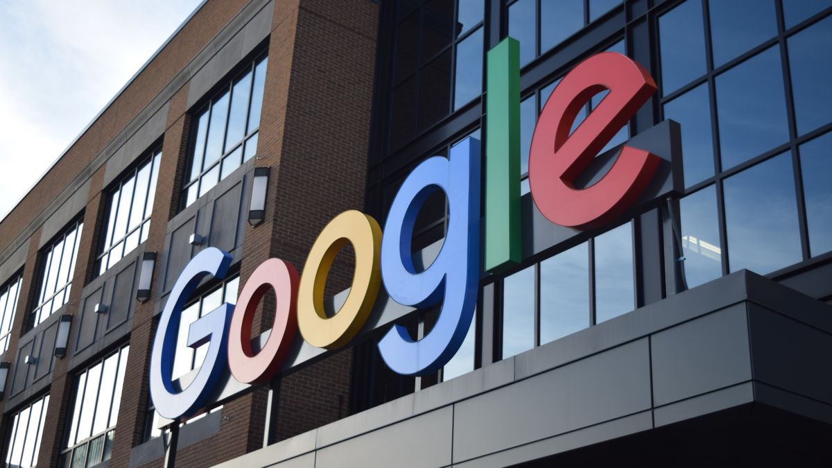 An angled close up of the Google sign logo at a Google office